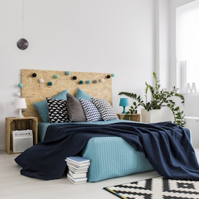 cozy bedroom interior with turquoise bedding 2026 03 10 03 12 03 utc