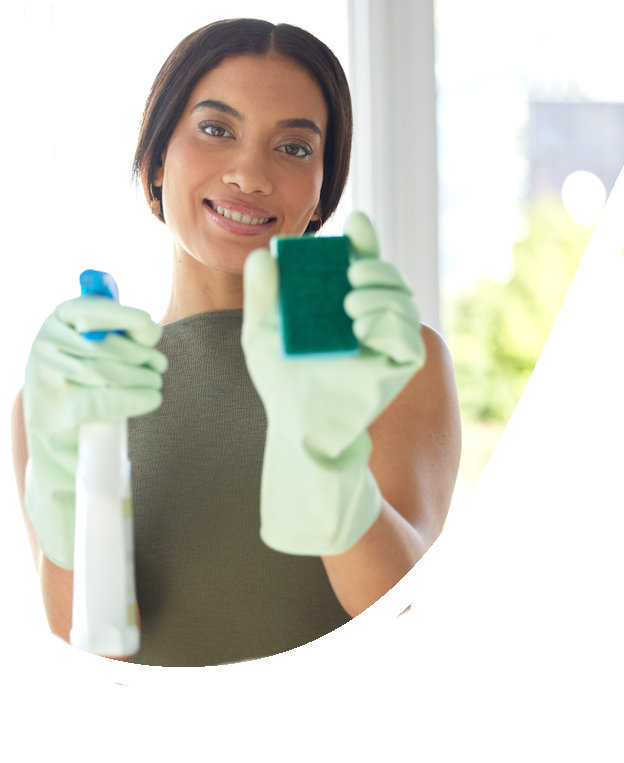 smiling woman holding spray bottle and sponge 2026 01 09 10 25 28 utc