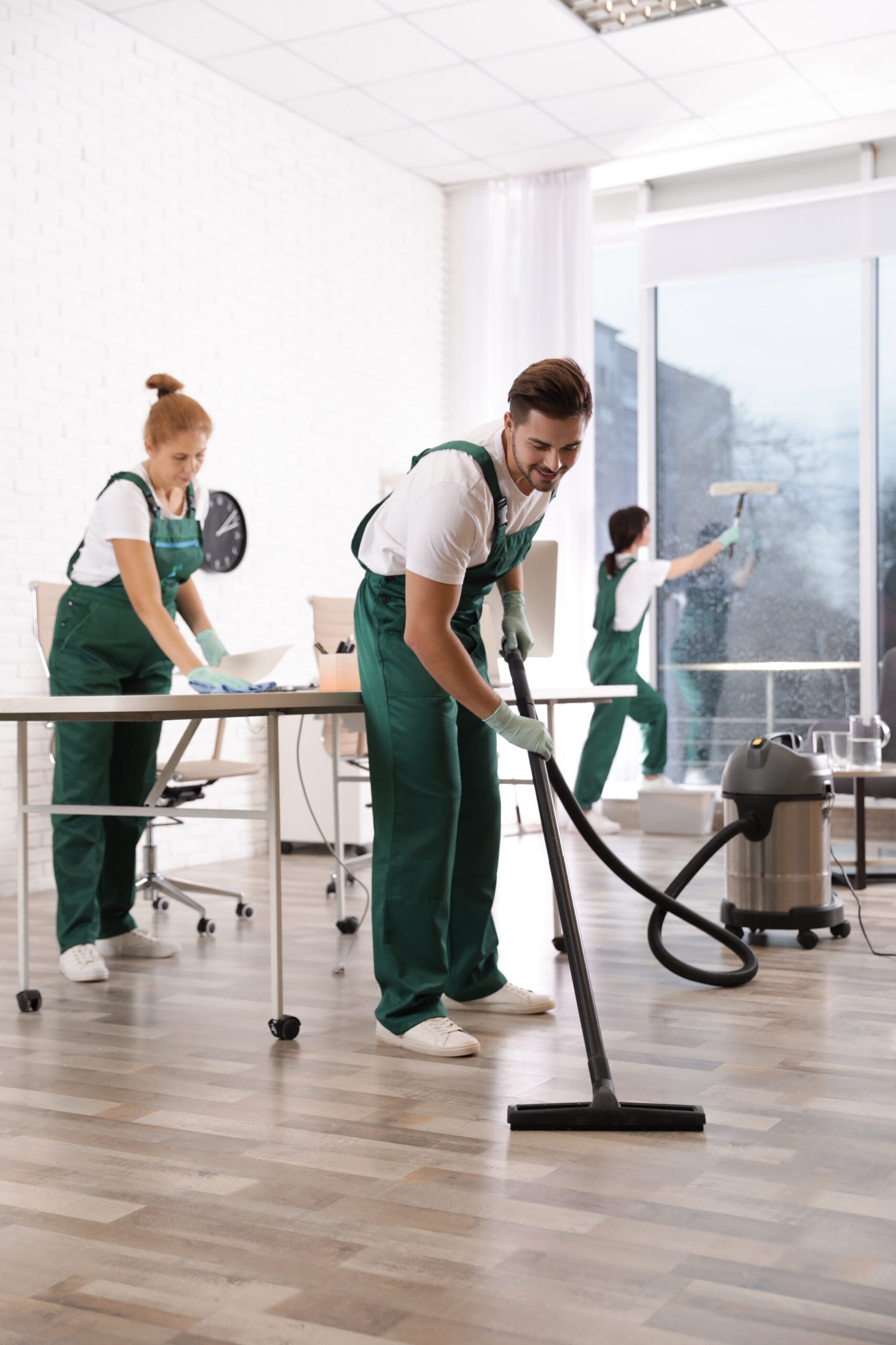 About Us 10 team of professional janitors working in modern of 2026 03 04 18 36 28 utc scaled
